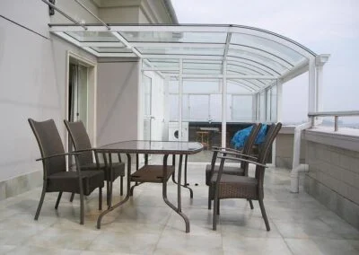 Pergola space as laundry room, sliding doors