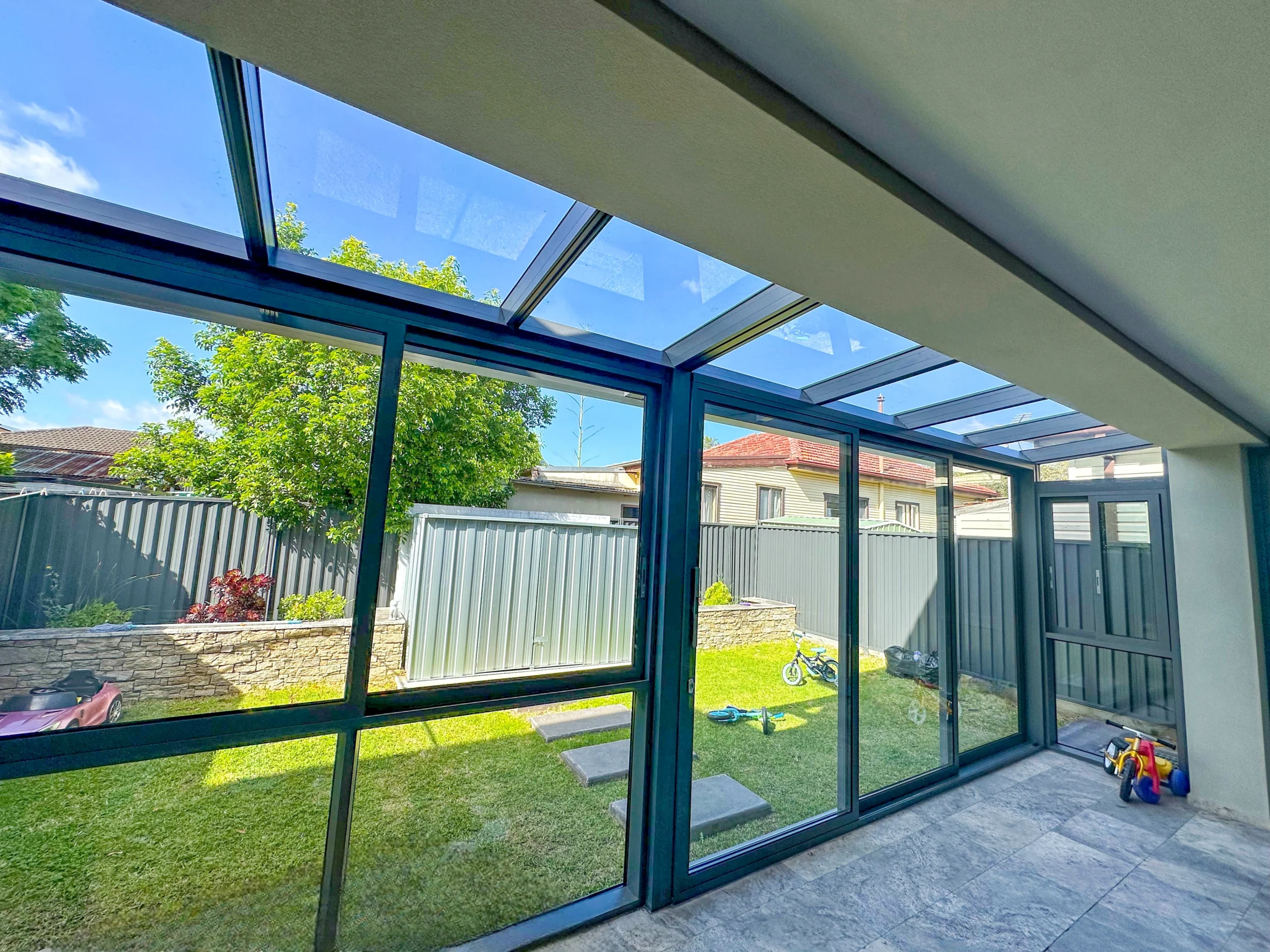 enclose balcony with glass